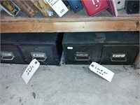 Old electric heater with filing cabinets.