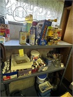 Items on Shelf Beside Workbench