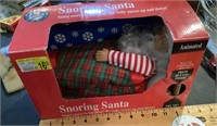 Animated snoring Santa toy