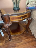 Pair of ornate end tables