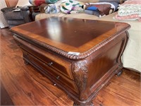 Ornate coffee table with 2 drawers