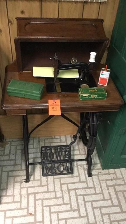 Howe antique treadle sewing machine and cabinet ,