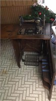 Antique Free treadle sewing machine w/cabinet