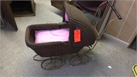 Antique wicker baby buggy