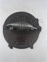 Old mountain bacon press pig
