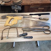 Hand saws, blades and snips.