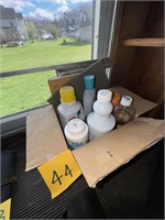 Box of cleaners, oil, etc. item