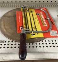 Coping saw and grinding wheel