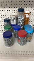 Containers of screws
