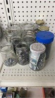 Containers of washers and screws