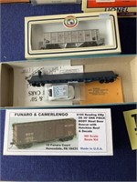 3 HO gauge train cars
Penn State and Reading