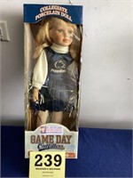 Penn State cheerleader
Porcelain doll, blonde