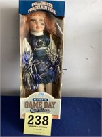 Penn State cheerleader 
porcelain doll,red hair