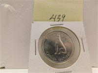 1967 CANADA 50 CENTS HOWLING WOLF SILVER