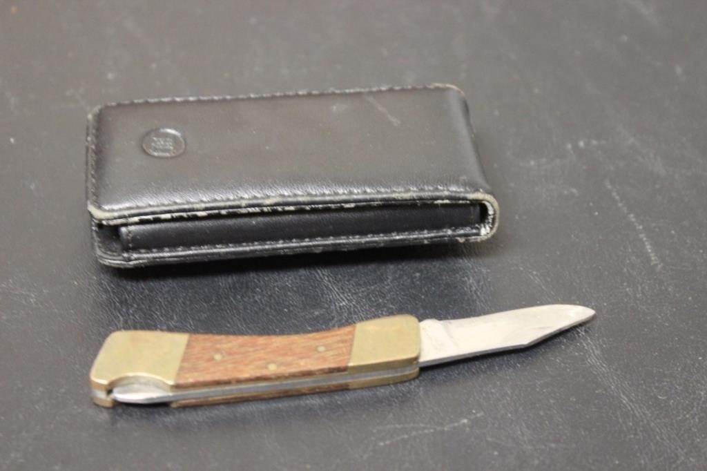 A Pocket Knife Inside a Leather Case
