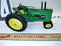 John Deere tractor metal toy.