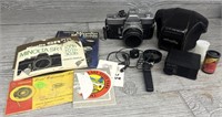 Minotta SRT 101 Camera w/ Books, Flash & Bag