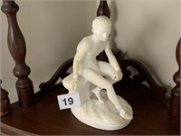 STATUE OF MAN SITTING ON ROCK 7" H (RIGHT THIGH