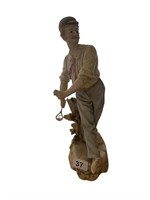FIGURINE 14" H OF MALE PLAYING BADMINTON