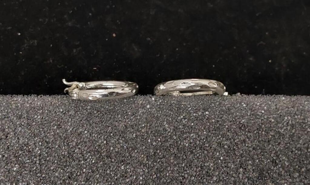 Sterling silver hoop earrings. Stamped 925