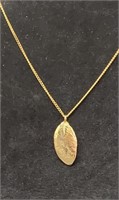 Gold colored leaf pendant necklace