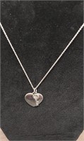 Heart & key pendant necklace. Heart says The key