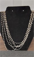 Vintage 6 strand beaded necklace. White & light