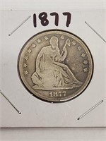 1877 Seated half dollar