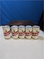 5 leinenkugels beer cans containing 2 golf balls