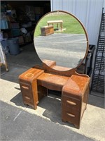 Oval mirrored dressing table with 4-drawers