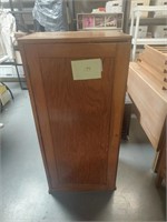 Wood cabinet w/ light inside, 2 doors, 22" x 16",