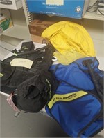 Two aqua lung diving vests and divers bag