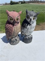 2 large plastic owls