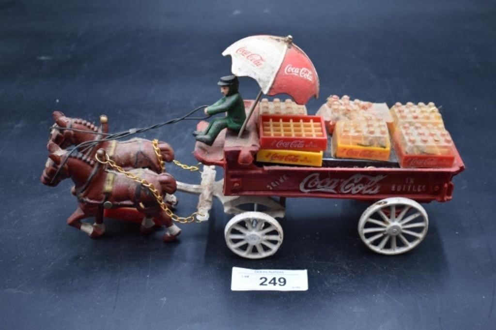 Vintage Coca cola Cast Iron Horse Drawn Wagon.
