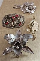 Four Floral Shaped Brooches Lot