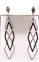 Pair genuine black/white diamond earrings