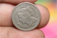 An 1868 Three Cent Piece