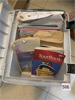 FILE BIN FILLED WITH TOURISM GUIDES