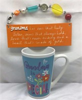 F4). GRANDMA CERAMIC SIGN AND TALL COFFEE MUG,