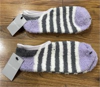 C2) 2 pairs of fuzzy short slipper socks. Woman’s