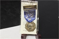 A Clinton County Fireman's Association Medal