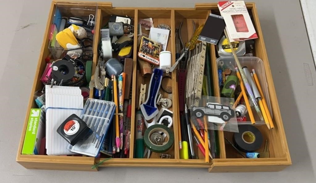 Large drawer with office supplies etc