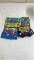 4 vintage handheld games