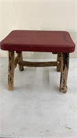 Primitive wooden bench milking stool