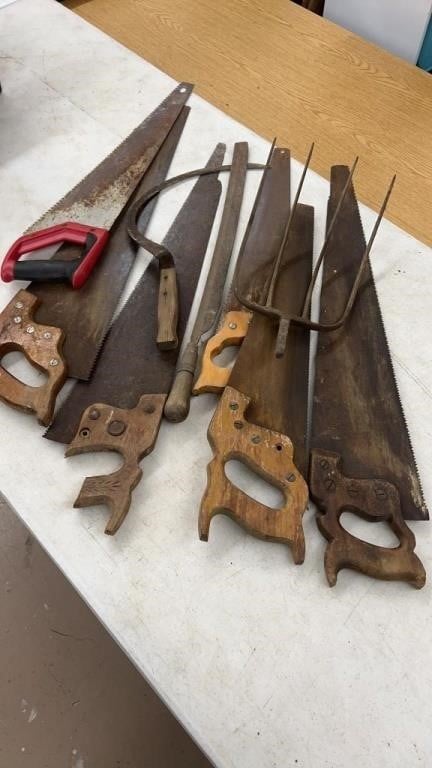 Old handsaws, pitchfork, etc.