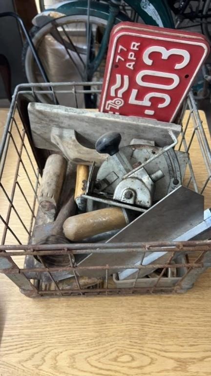 Concrete, tools, oil spout, license plates, etc.