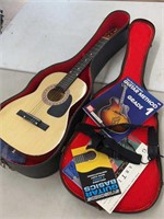 Vintage guitar w/ case, strap, booklets