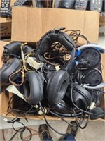 Large lot of headphones, various brands. As