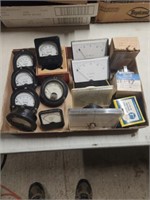 Lot of amp and volt meters, various makers.