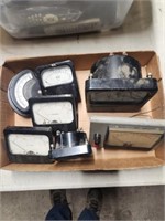 Lot of amp and volt meters, various makers.